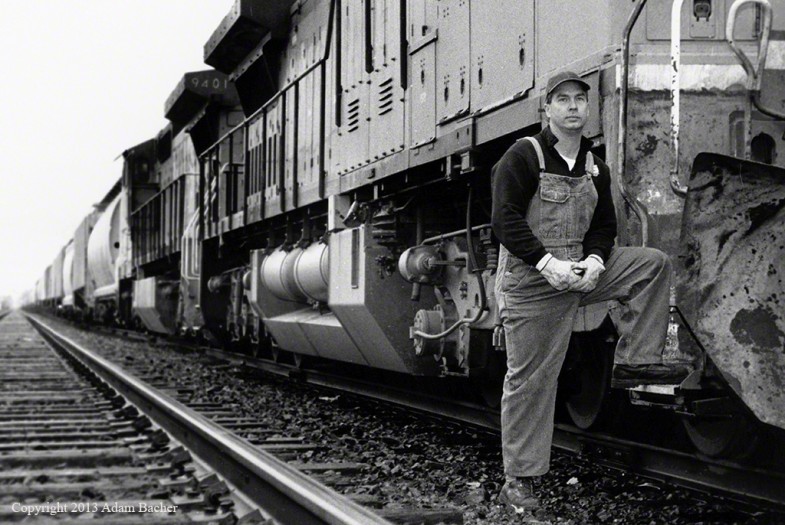 Conductor and Train,  ©2013 Adam Bacher