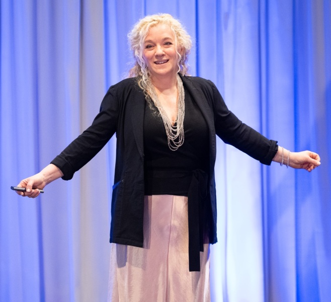 Allison Massari on stage at helix Mastermind