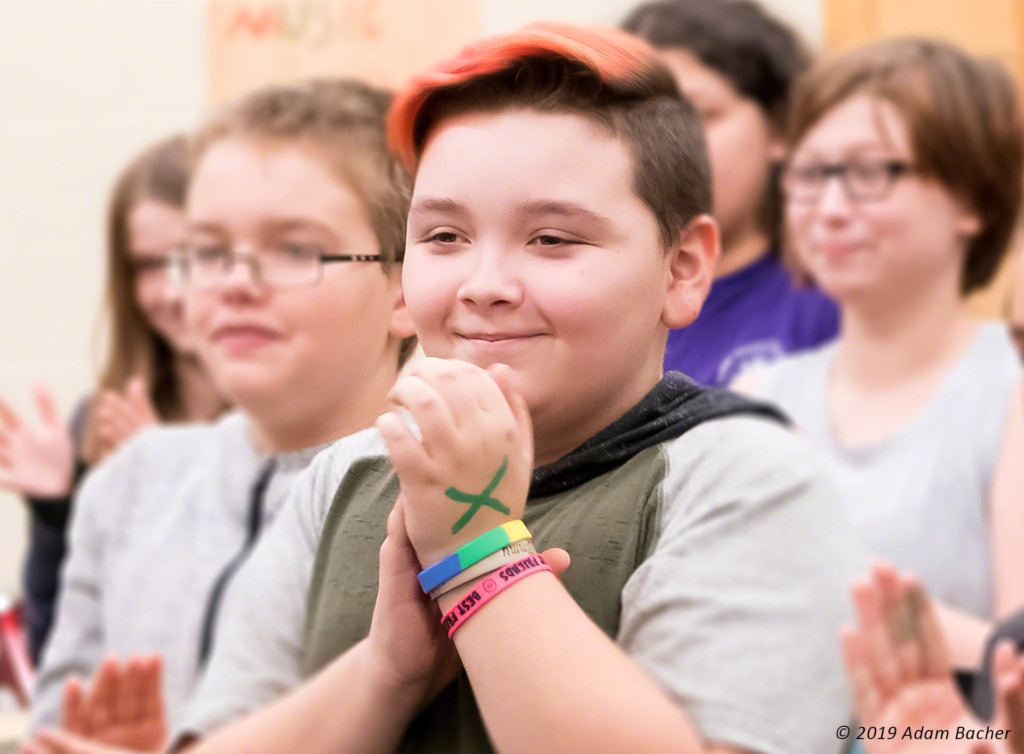 boy with hands clasped, education photography boy with hands clasped, education photography